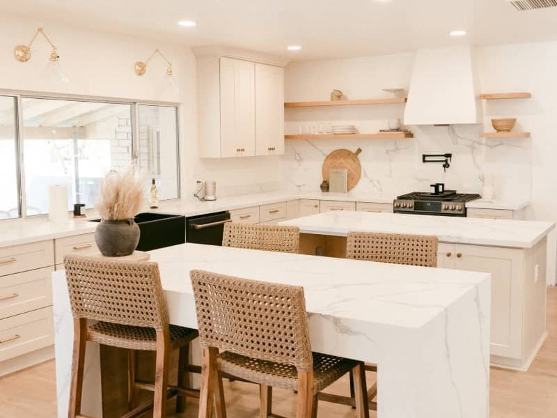 Bright kitchen with a stylish design and light flooring